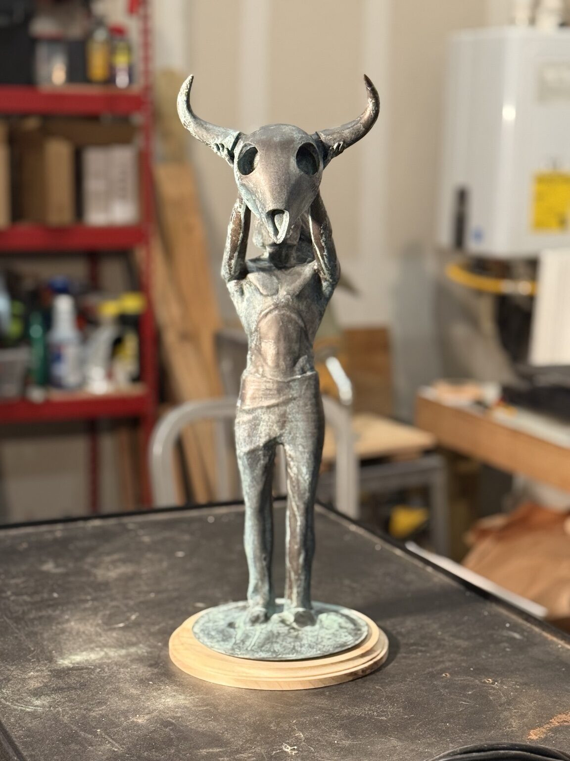 Patinated sculpture detail in warm bronze tones